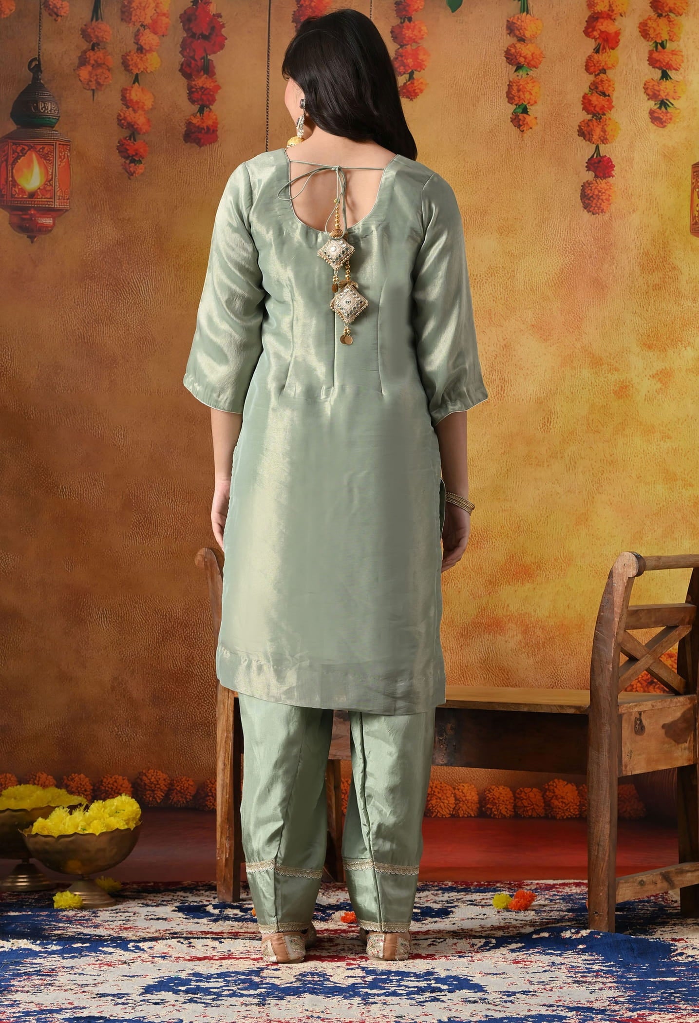 Pistachio Green Tissue Organza Kurta Set with intricate zardozi and sequin work, paired with a peach dupatta and straight pants