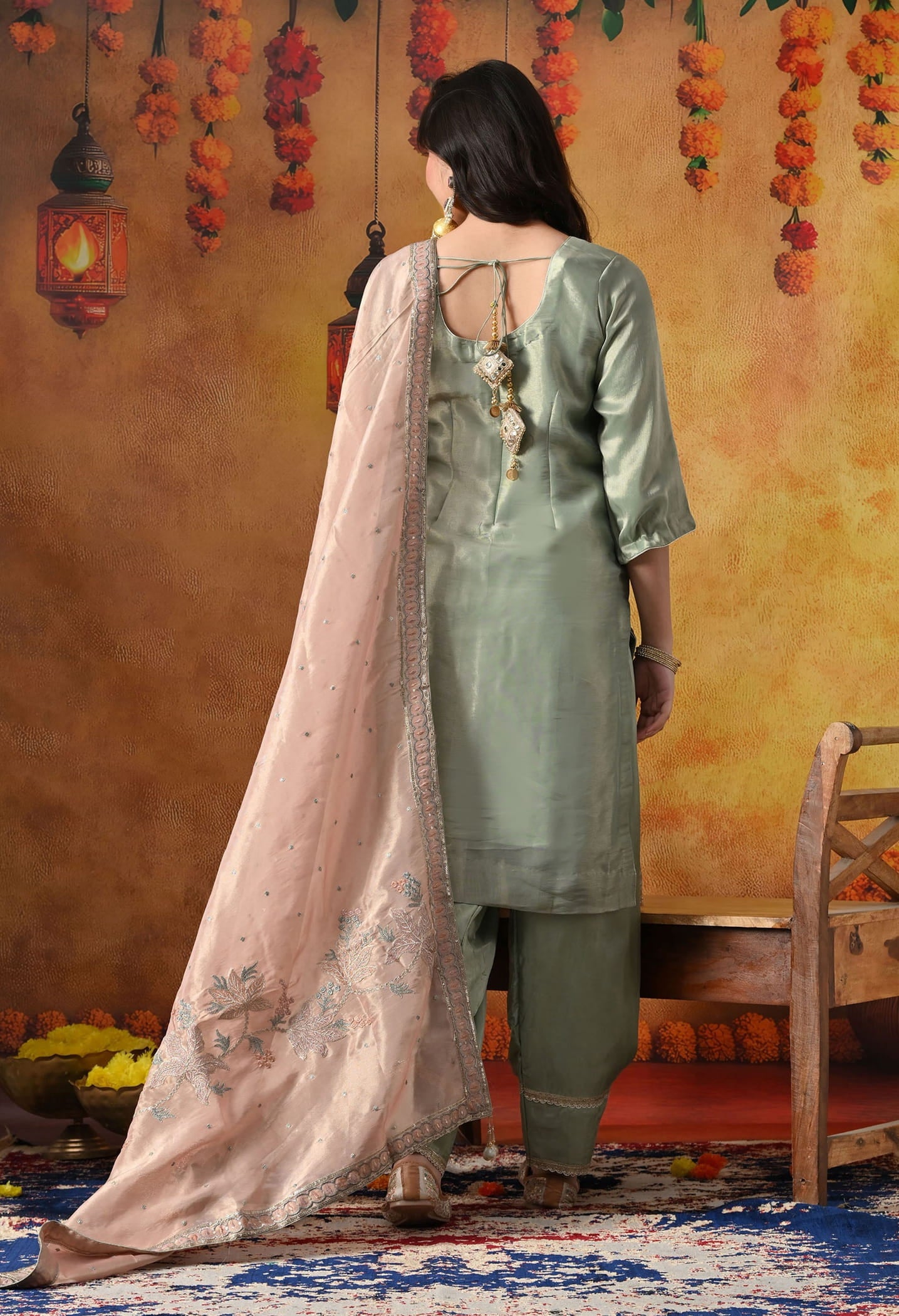 Pistachio Green Tissue Organza Kurta Set with intricate zardozi and sequin work, paired with a peach dupatta and straight pants