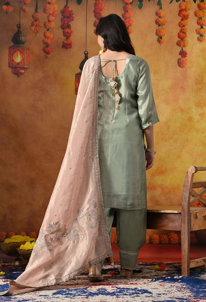 Pistachio Green Tissue Organza Kurta Set with intricate zardozi and sequin work, paired with a peach dupatta and straight pants