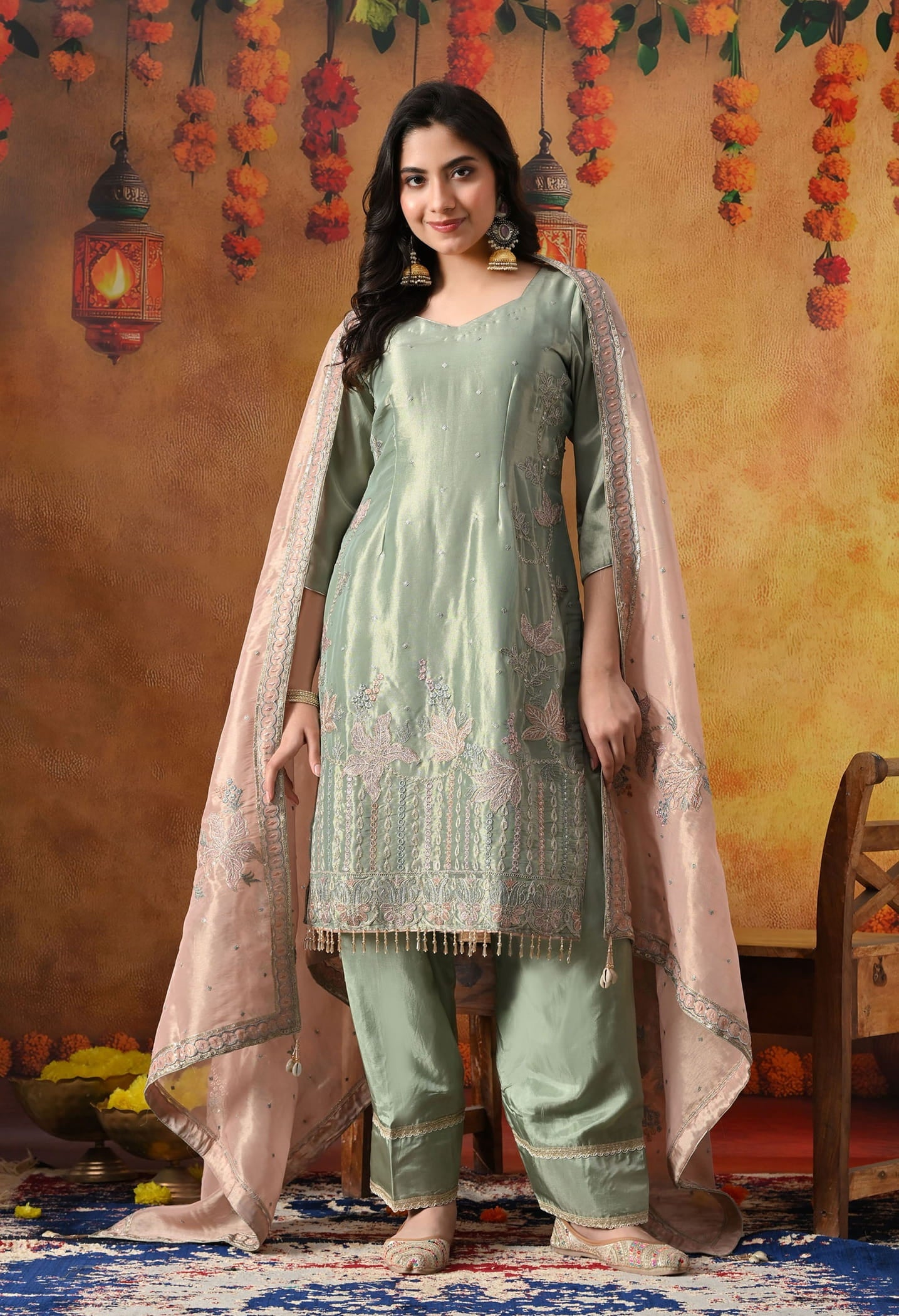 Pistachio Green Tissue Organza Kurta Set with intricate zardozi and sequin work, paired with a peach dupatta and straight pants
