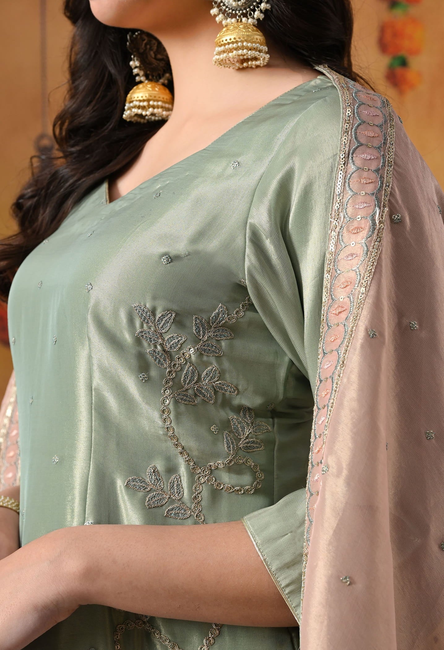 Pistachio Green Tissue Organza Kurta Set with intricate zardozi and sequin work, paired with a peach dupatta and straight pants