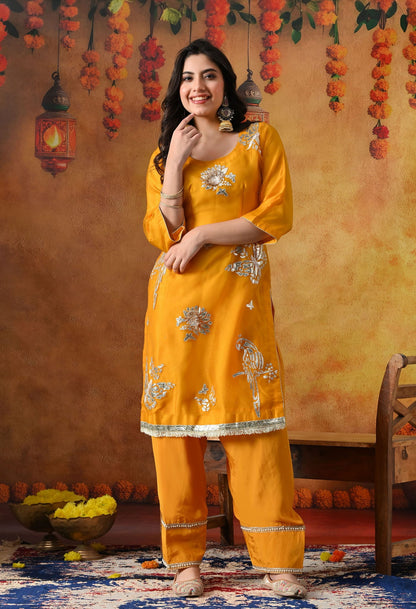 Orangeish Yellow Tissue Organza Kurta Set with intricate gotta, zardozi, and crystal work, paired with a farshi salwar
