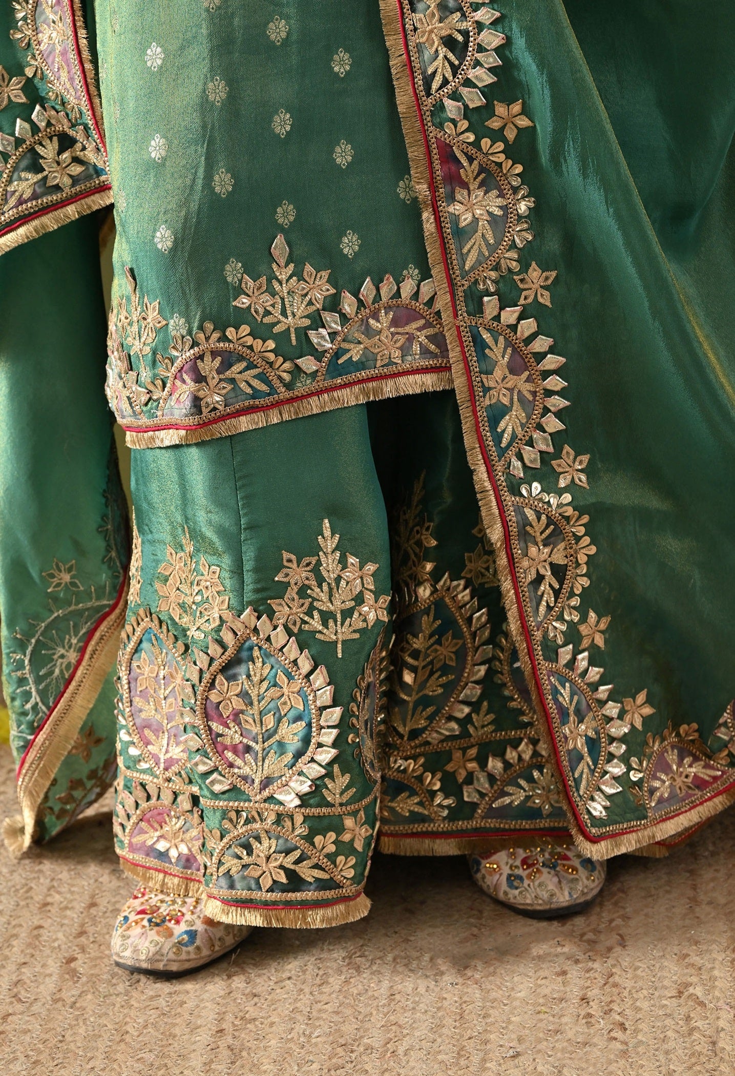 Green Tissue Silk Sharara Set with Gotta, Applique & Zardozi Work.