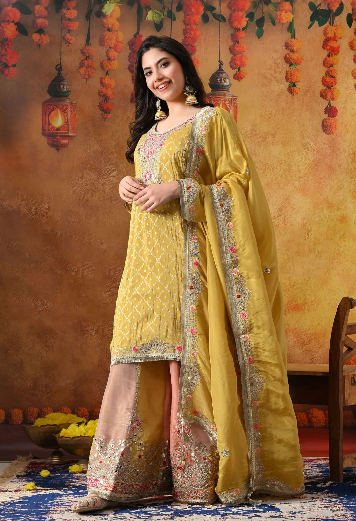 Yellow Tissue Crepe Sharara Set with intricate gotta, zardozi, applique, and thread work, paired with a multicolour sharara and matching dupatta