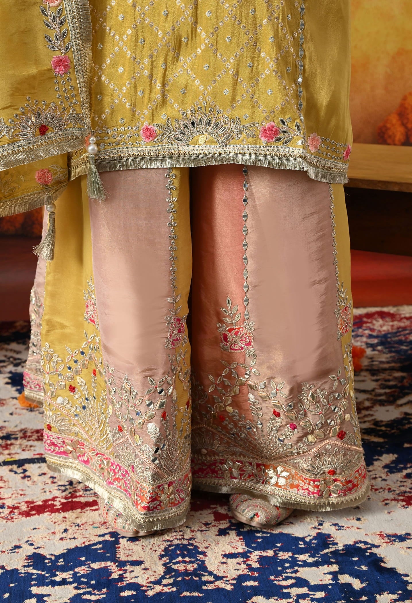 Yellow Tissue Crepe Sharara Set with intricate gotta, zardozi, applique, and thread work, paired with a multicolour sharara and matching dupatta