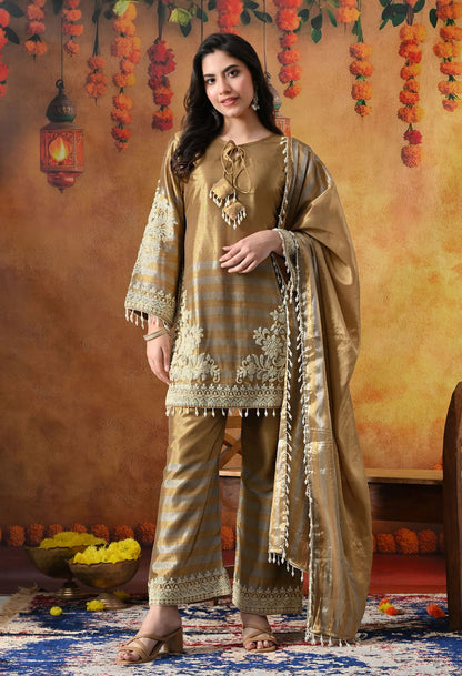 Elegant golden kurta set in tissue silk with thread and pearl work, paired with straight pants and matching dupatta