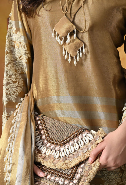 Elegant golden kurta set in tissue silk with thread and pearl work, paired with straight pants and matching dupatta