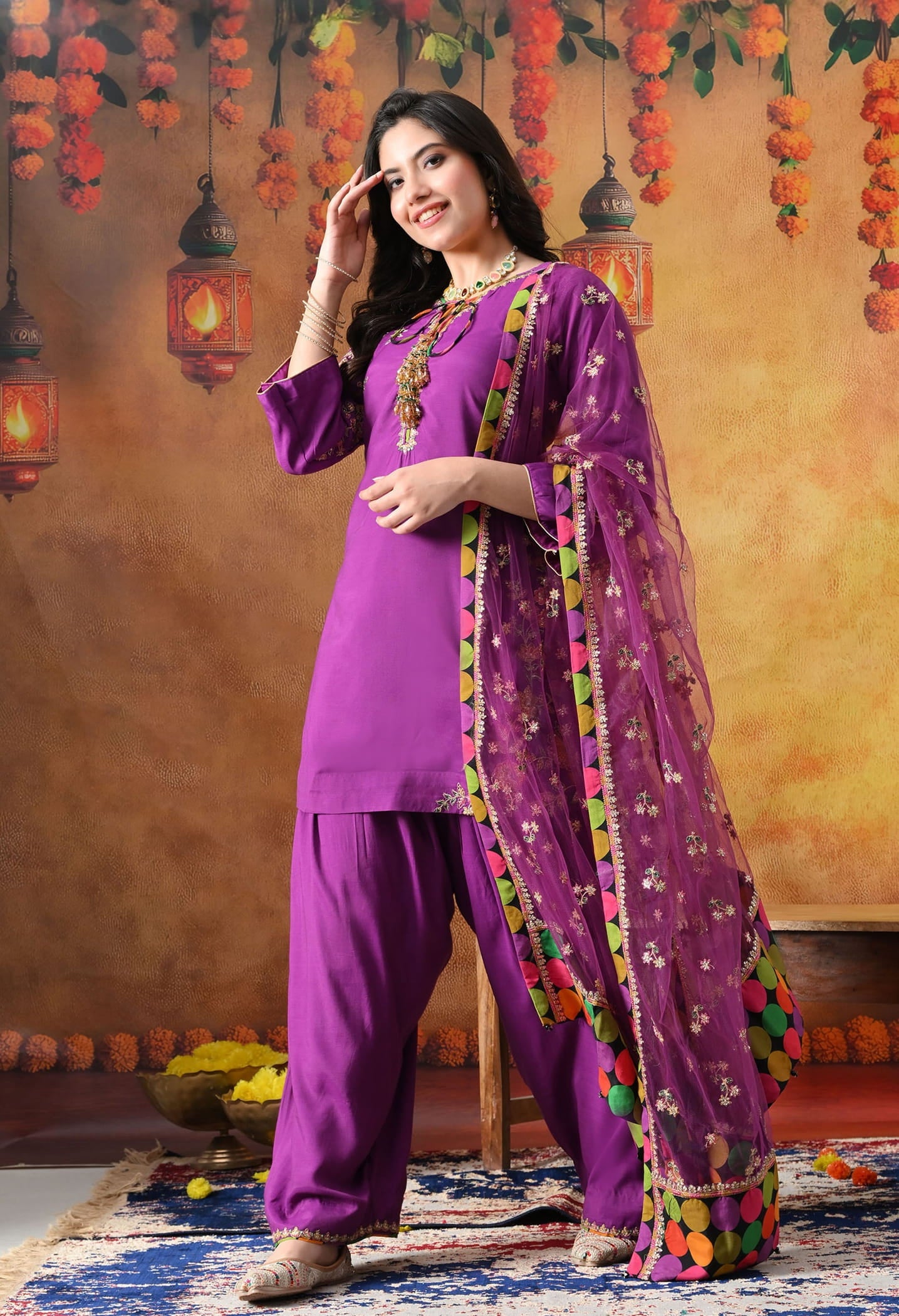 Elegant purple kurta set in cotton silk with thread, zardozi, and sequin work, paired with a graceful farshi salwar and net dupatta