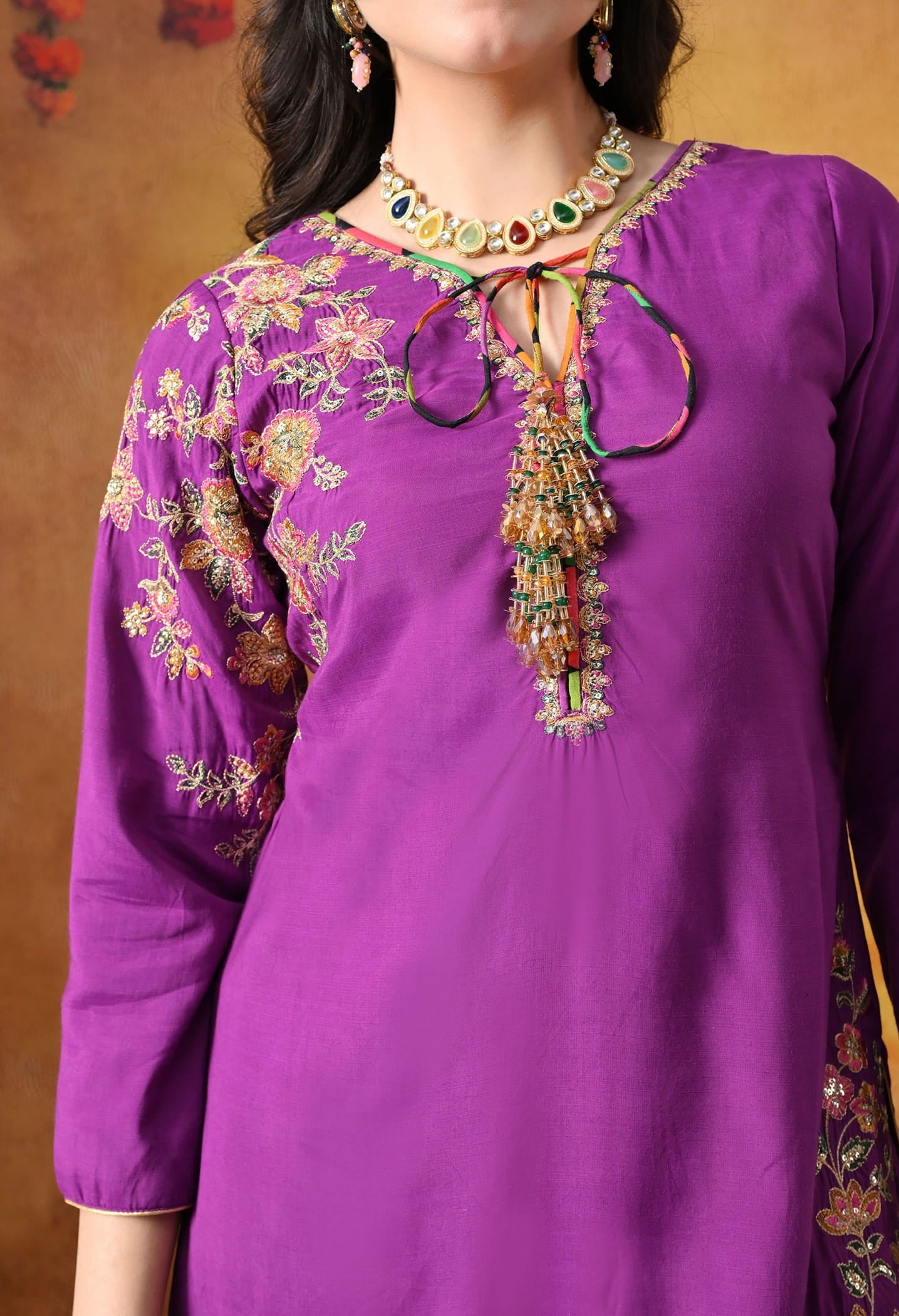 Elegant purple kurta set in cotton silk with thread, zardozi, and sequin work, paired with a graceful farshi salwar and net dupatta