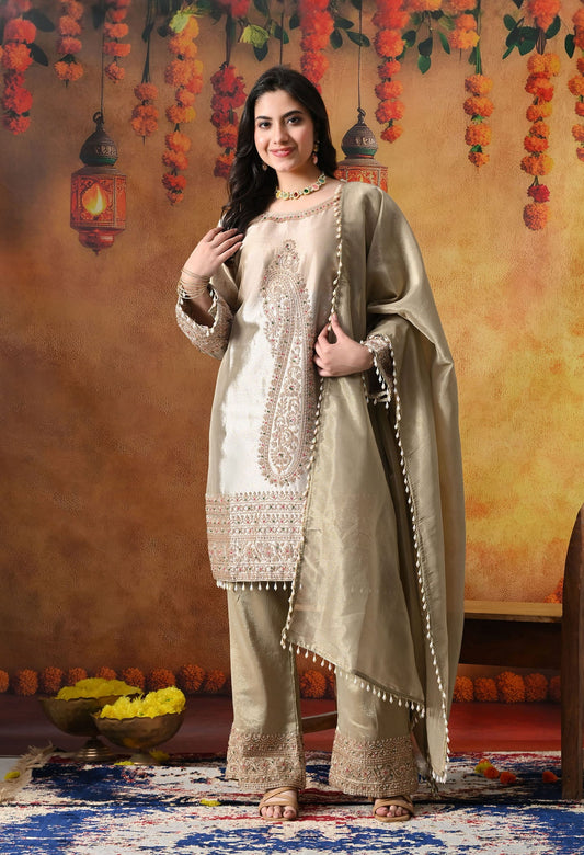 Golden Tissue Silk Kurta Set with intricate thread, pearl, and cutdana work, paired with a tissue organza dupatta and umbrella pants