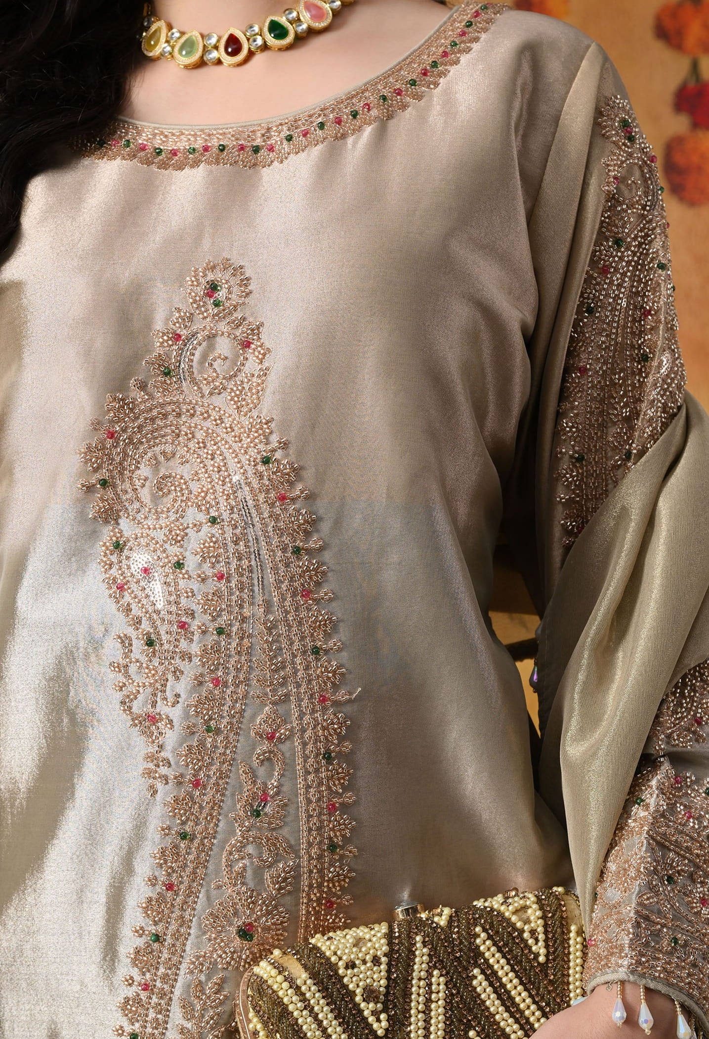 Golden Tissue Silk Kurta Set with intricate thread, pearl, and cutdana work, paired with a tissue organza dupatta and umbrella pants