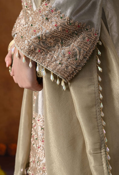 Golden Tissue Silk Kurta Set with intricate thread, pearl, and cutdana work, paired with a tissue organza dupatta and umbrella pants