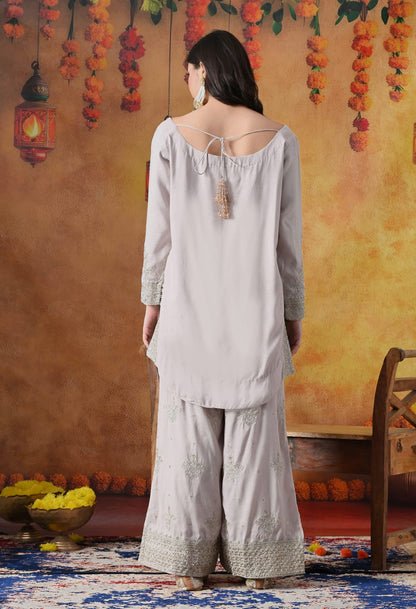 Light Pink Cotton Silk Kurta Set with intricate zardozi and sequin work, paired with plazo pants and matching dupatta