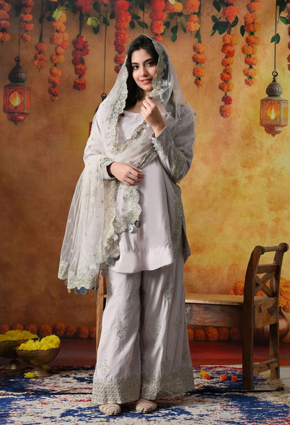 Light Pink Cotton Silk Kurta Set with intricate zardozi and sequin work, paired with plazo pants and matching dupatta