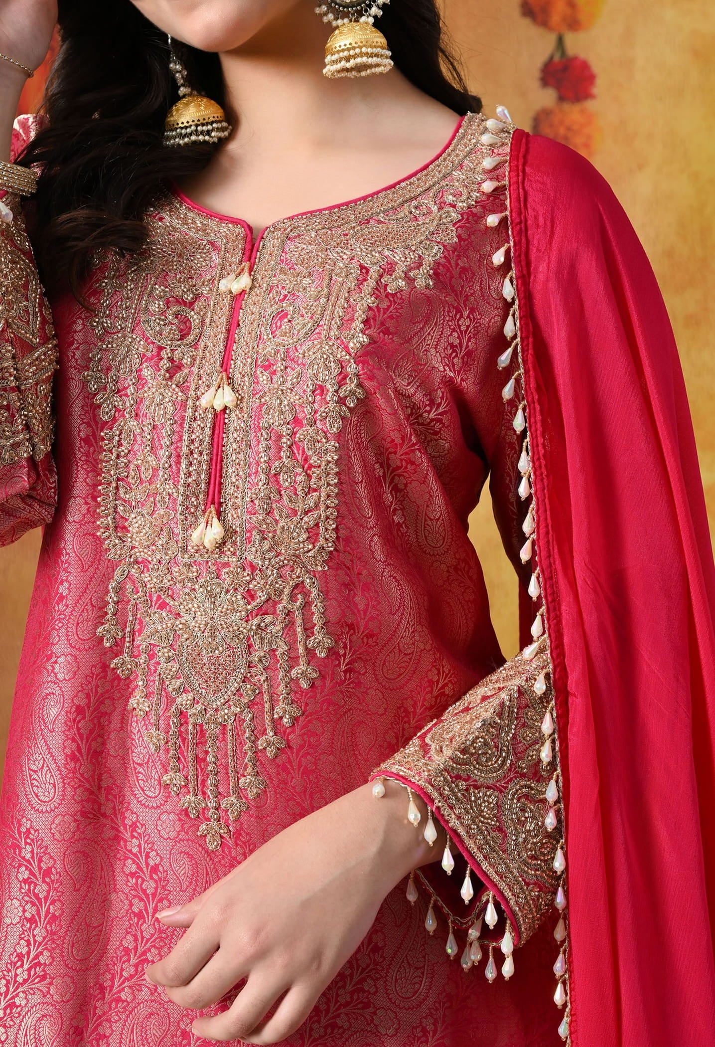 Hot Pink Banarasi Silk Sharara Set with intricate thread, cutdana, pearl, and sequin work, paired with a chinon dupatta.