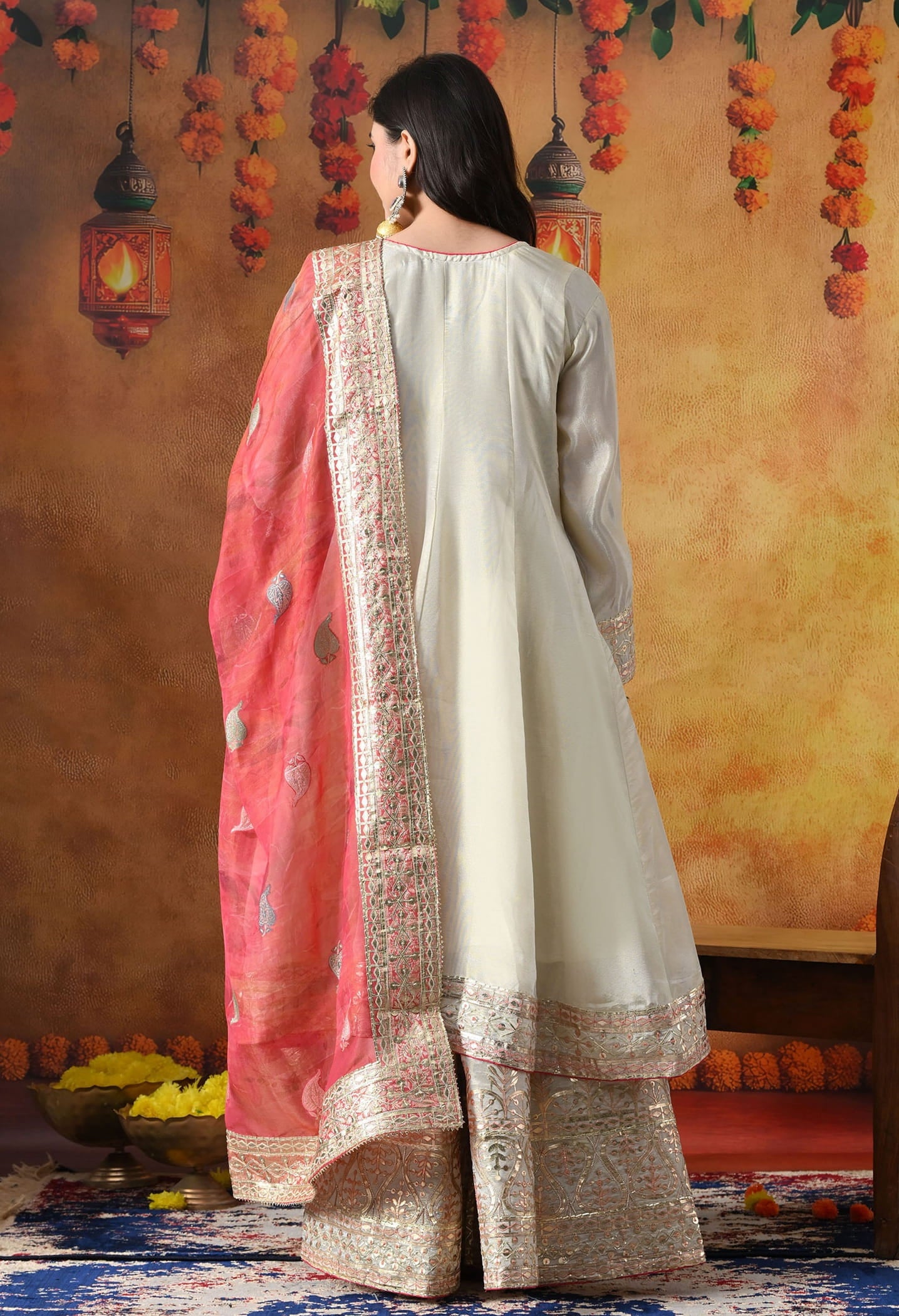 Golden Cream Tissue Crepe Sharara Set with intricate gotta, zardozi, and thread work, paired with a pink tissue organza dupatta
