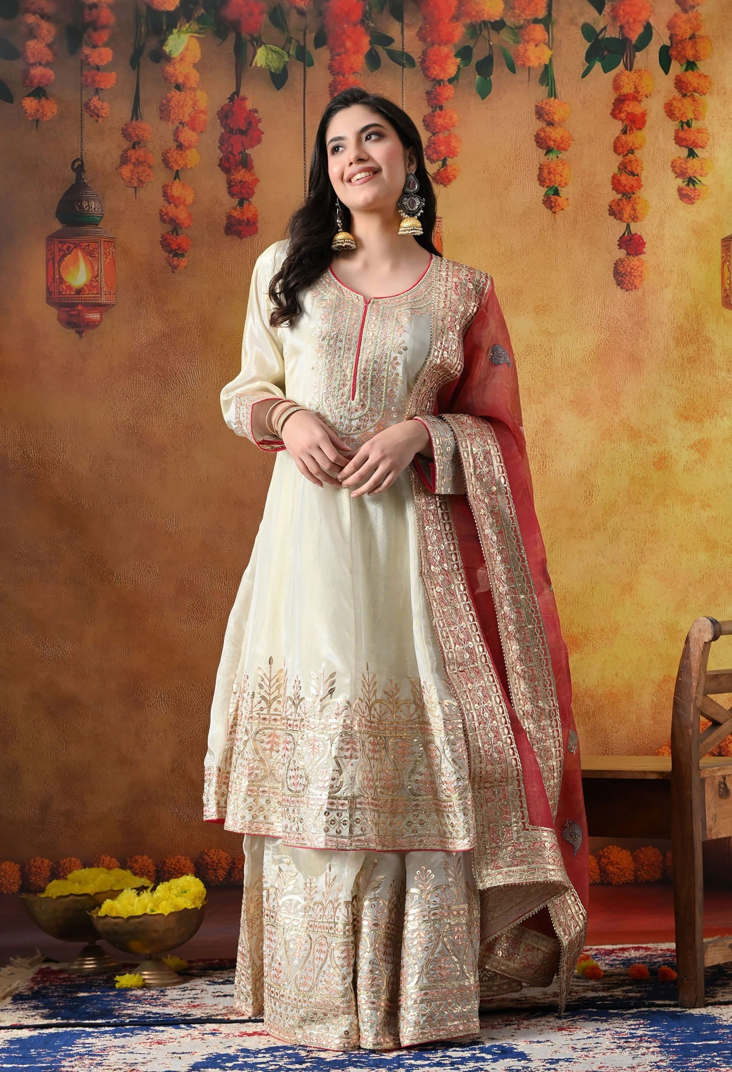 Golden Cream Tissue Crepe Sharara Set with intricate gotta, zardozi, and thread work, paired with a pink tissue organza dupatta