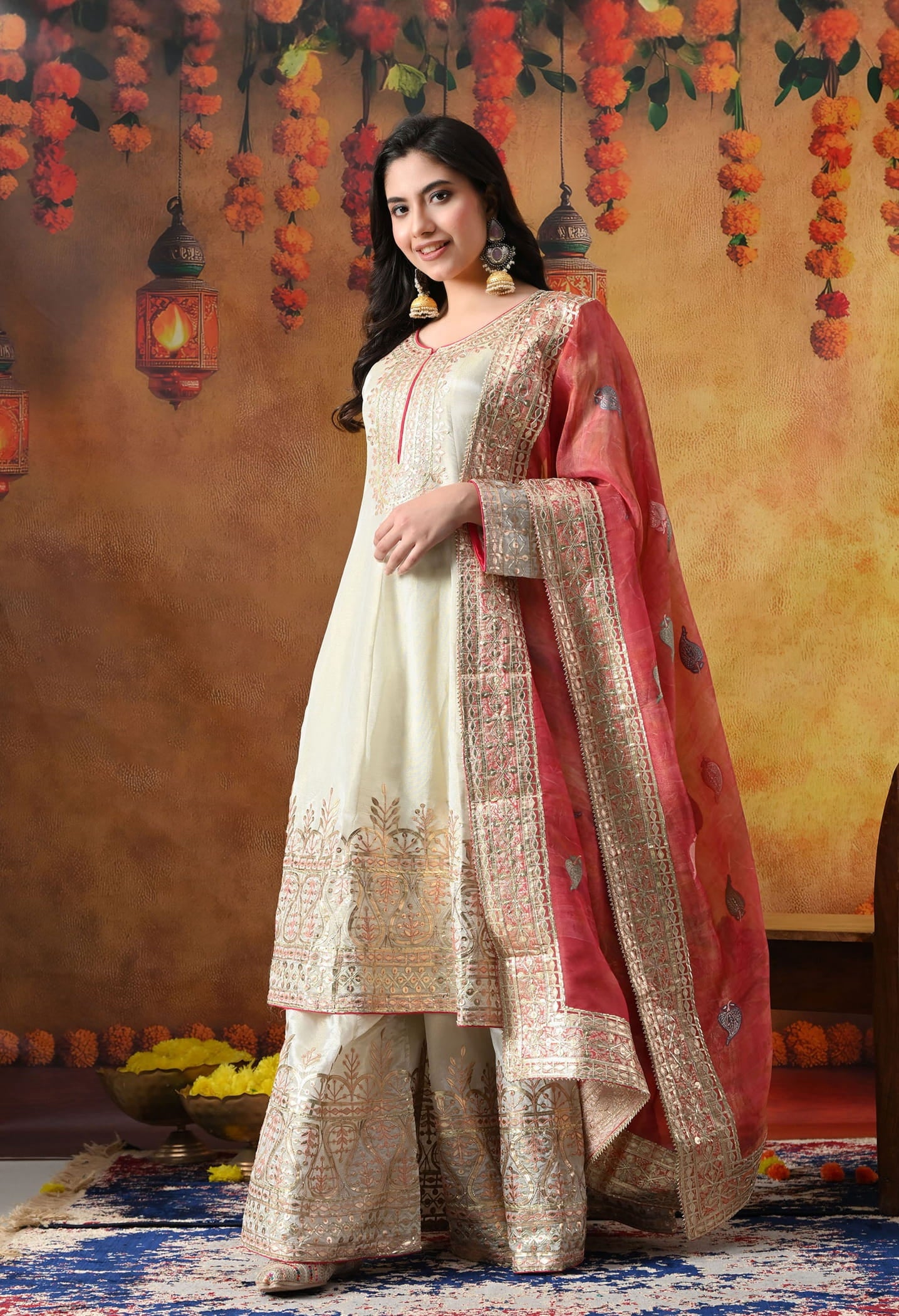 Golden Cream Tissue Crepe Sharara Set with intricate gotta, zardozi, and thread work, paired with a pink tissue organza dupatta