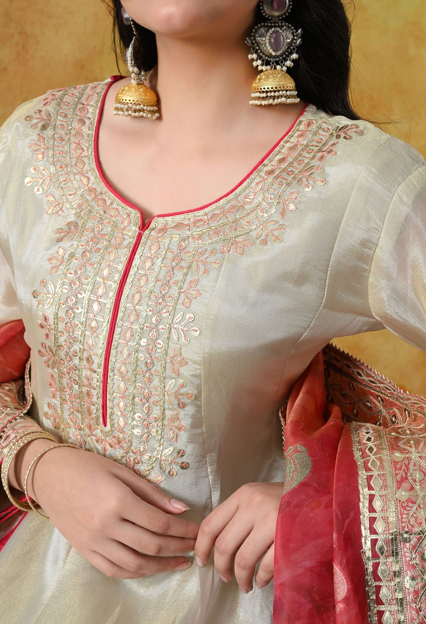 Golden Cream Tissue Crepe Sharara Set with intricate gotta, zardozi, and thread work, paired with a pink tissue organza dupatta
