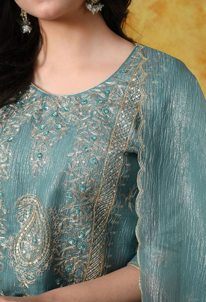 Turquoisesh Blue Sharara Set in crust tissue organza with intricate zardozi, dabka, sequin, and pearl work, paired with a crepe sharara