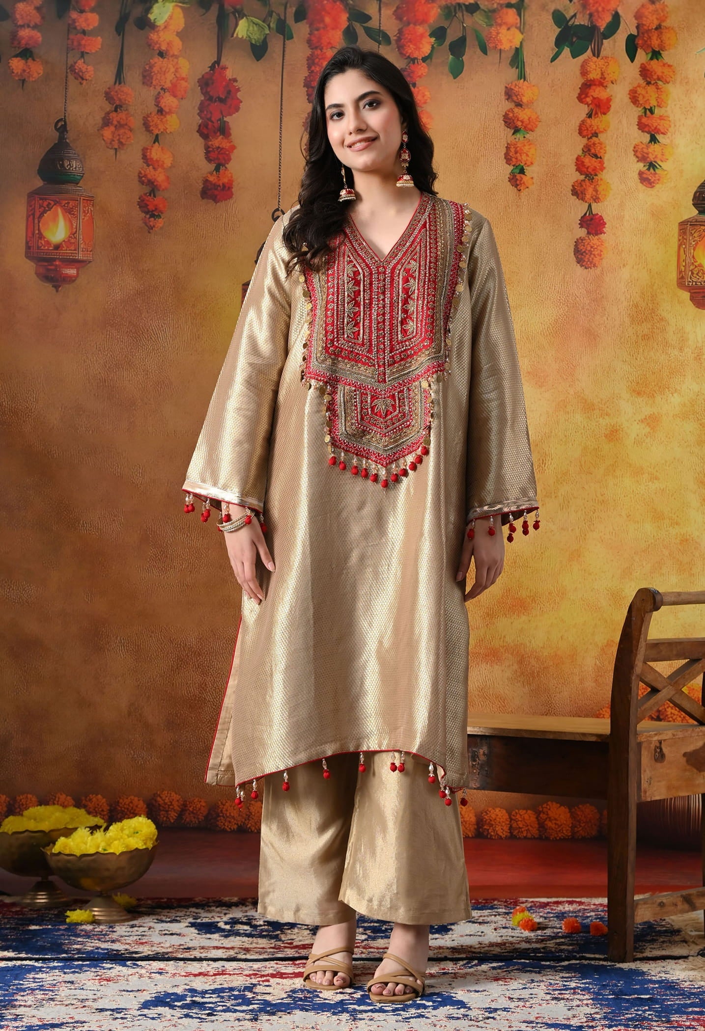 Golden Banarasi Silk Kurta Set with intricate zardozi, pearl, and dabka work, paired with a contrasting red organza dupatta and tissue silk palazzo