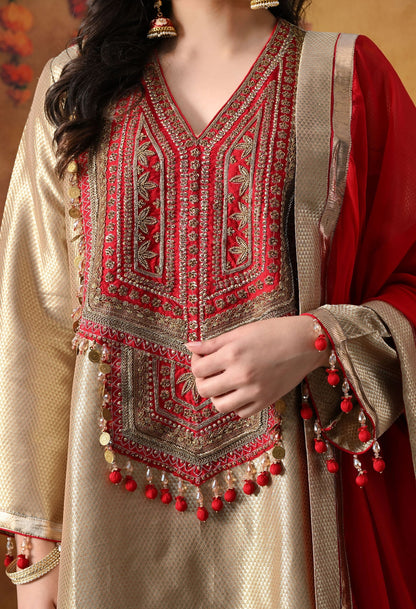 Golden Banarasi Silk Kurta Set with intricate zardozi, pearl, and dabka work, paired with a contrasting red organza dupatta and tissue silk palazzo