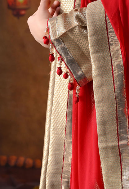 Golden Banarasi Silk Kurta Set with intricate zardozi, pearl, and dabka work, paired with a contrasting red organza dupatta and tissue silk palazzo
