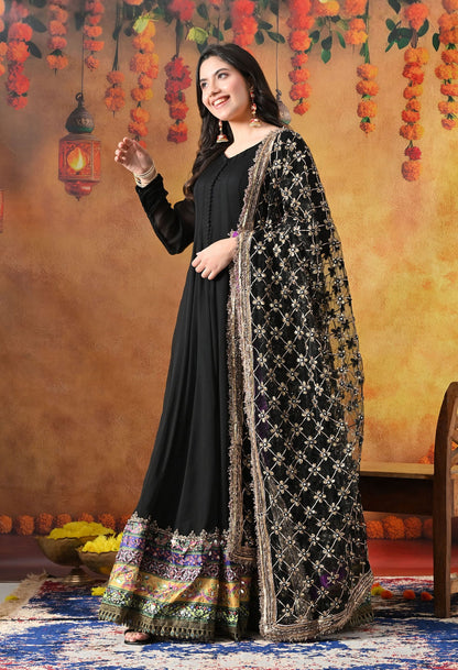 Black Chiffon Anarkali Set with intricate mirror, gotta, and sequin work, paired with a net dupatta and satin silk churidar