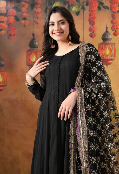Black Chiffon Anarkali Set with intricate mirror, gotta, and sequin work, paired with a net dupatta and satin silk churidar