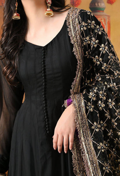 Black Chiffon Anarkali Set with intricate mirror, gotta, and sequin work, paired with a net dupatta and satin silk churidar