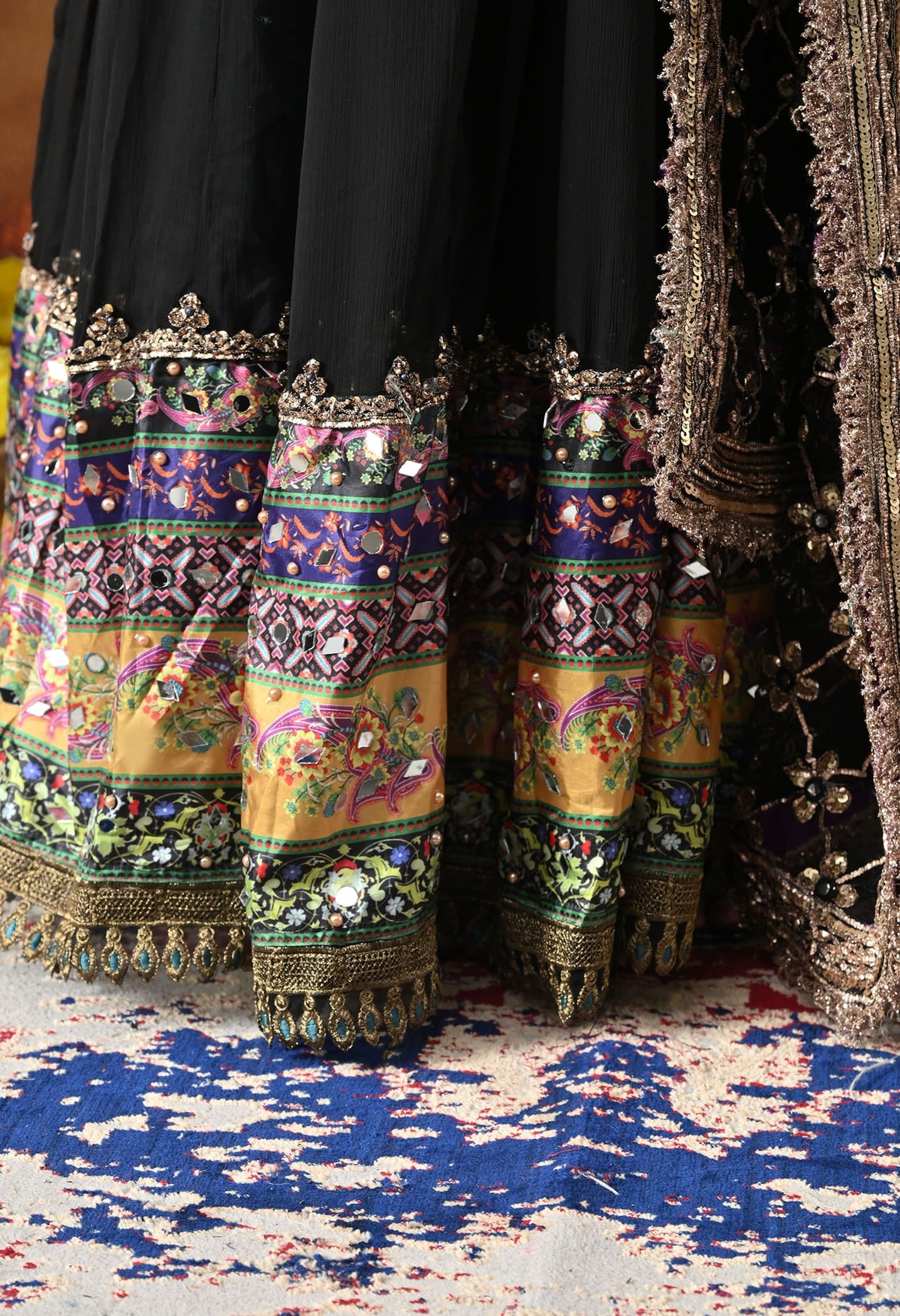 Black Chiffon Anarkali Set with intricate mirror, gotta, and sequin work, paired with a net dupatta and satin silk churidar