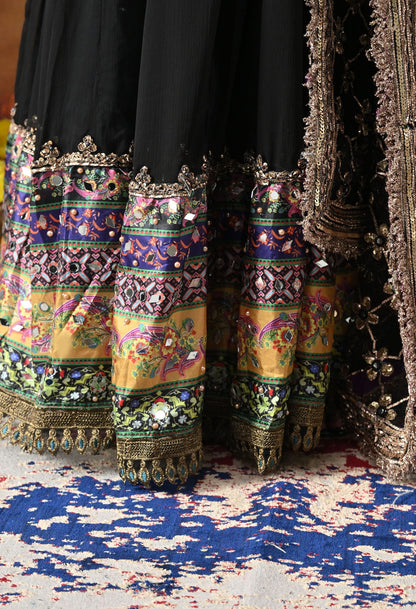 Black Chiffon Anarkali Set with intricate mirror, gotta, and sequin work, paired with a net dupatta and satin silk churidar