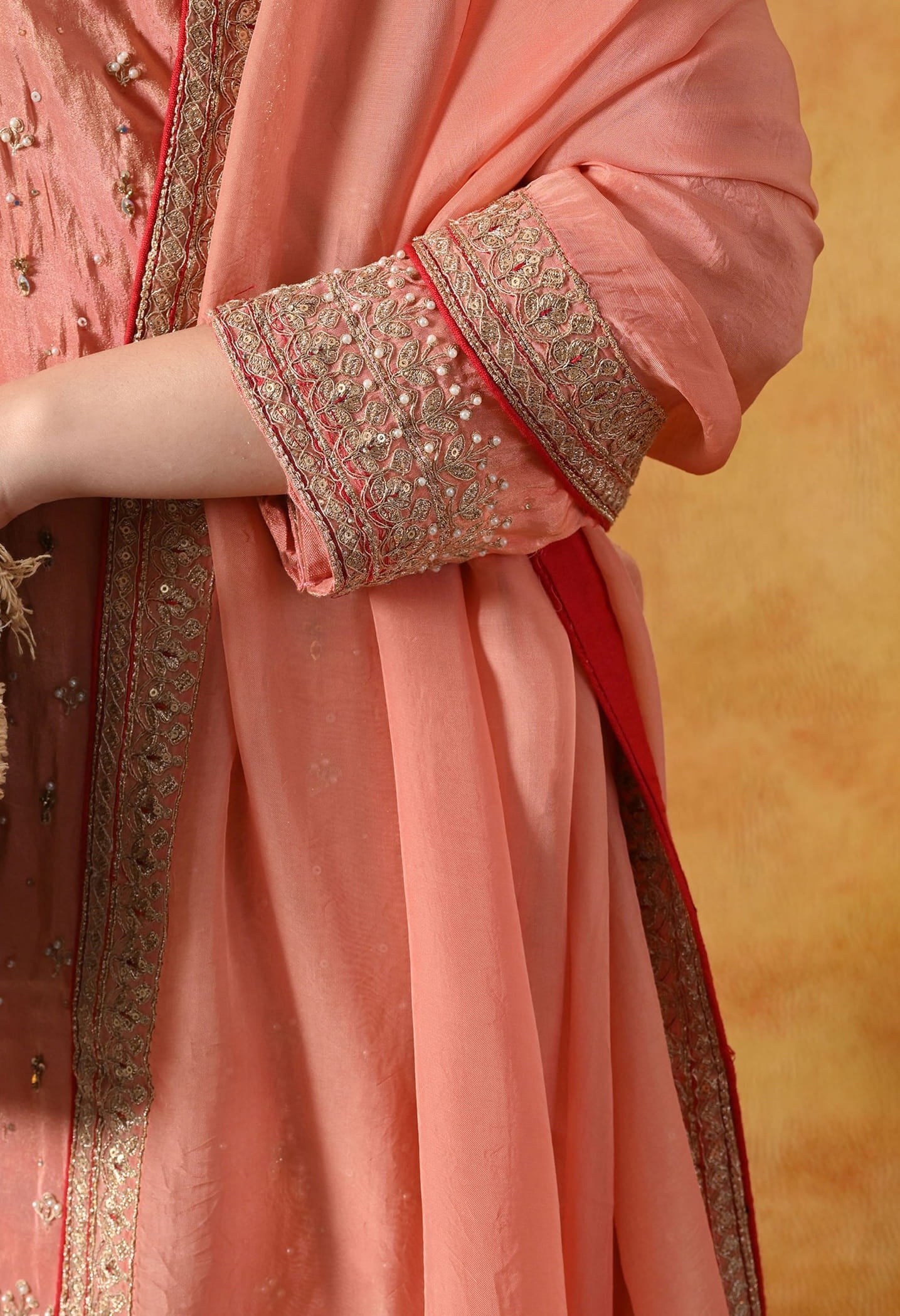 Peach Sharara Set with Zardozi, Applique, Thread & Sequin Work.