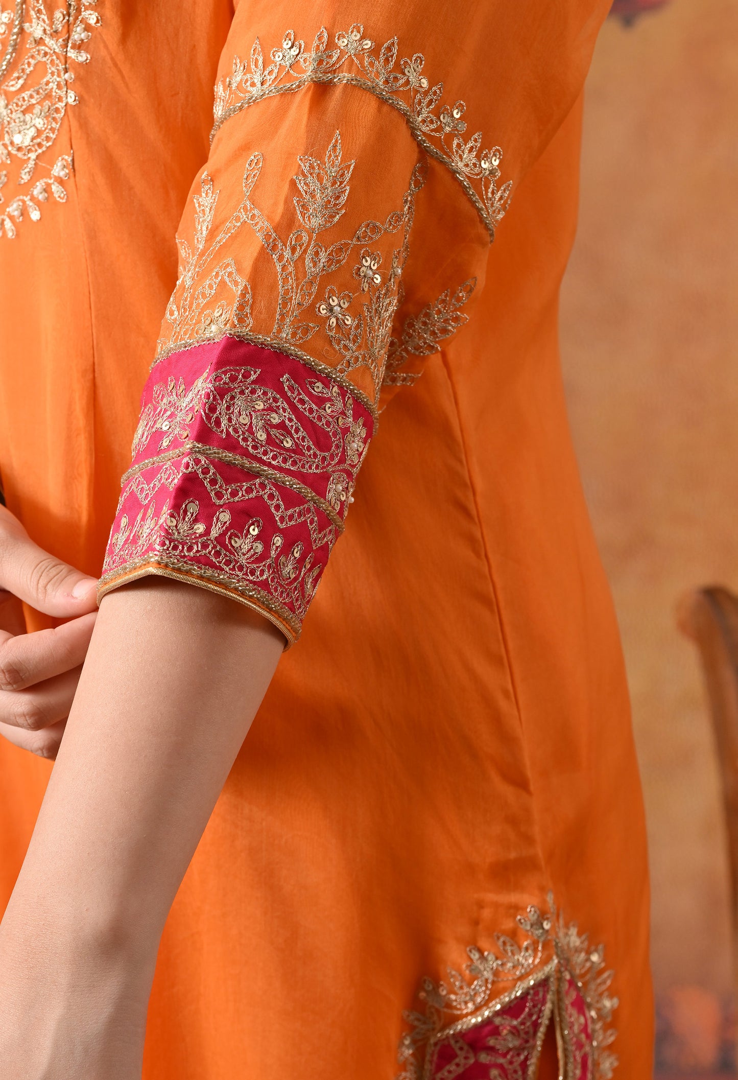 Vibrant Orange Kurta Set with Exquisite Zardozi Embroidery