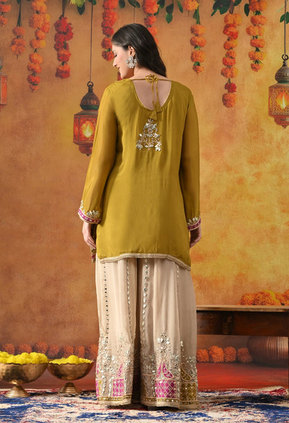 Green Chinon Sharara Set with Gotta, Mirror, Zardozi & Applique Work.