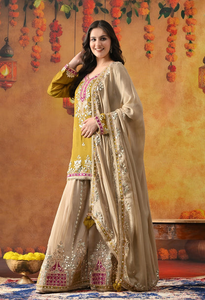 Green Chinon Sharara Set with Gotta, Mirror, Zardozi & Applique Work.