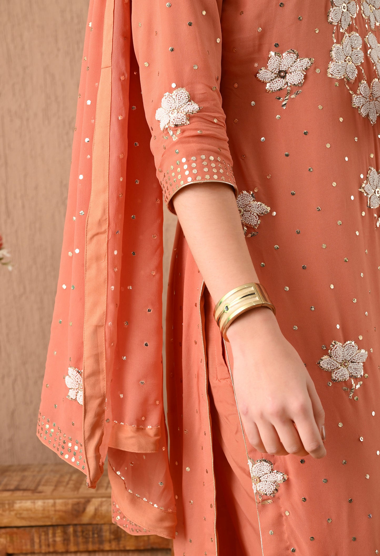 Gracious Dark Peach Kurta Set with Mukaish, Zardozi, Pearl, and Sequence Work