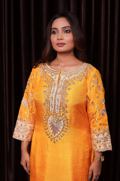 Elegant Saffron Yellow Silk Kurta Set with Intricate Embroidery