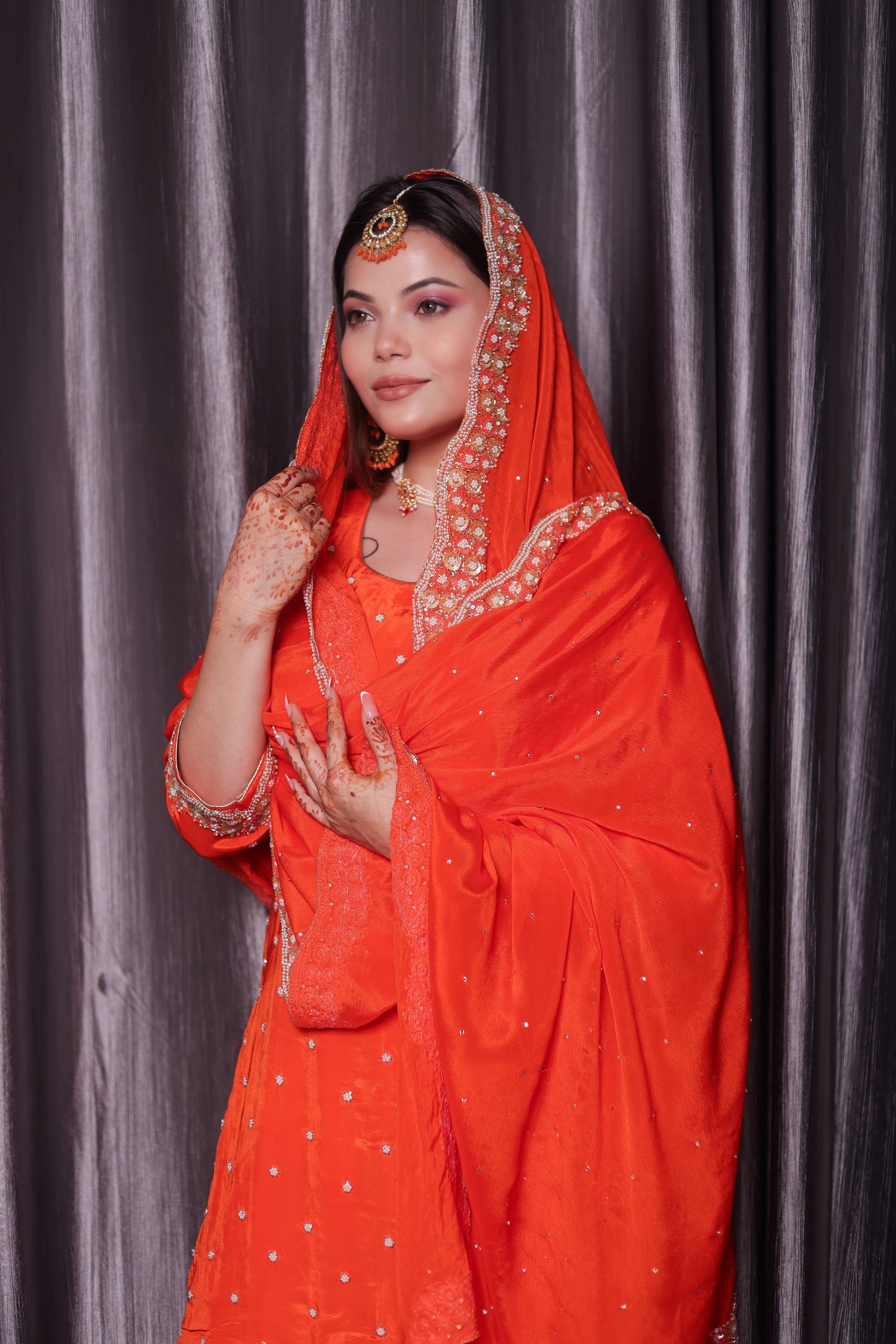 Vibrant Orange Kurta Set with Beautiful Zardozi, Pearl, and Cutdana Work