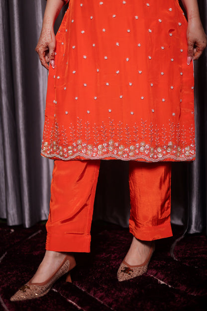 Vibrant Orange Kurta Set with Beautiful Zardozi, Pearl, and Cutdana Work