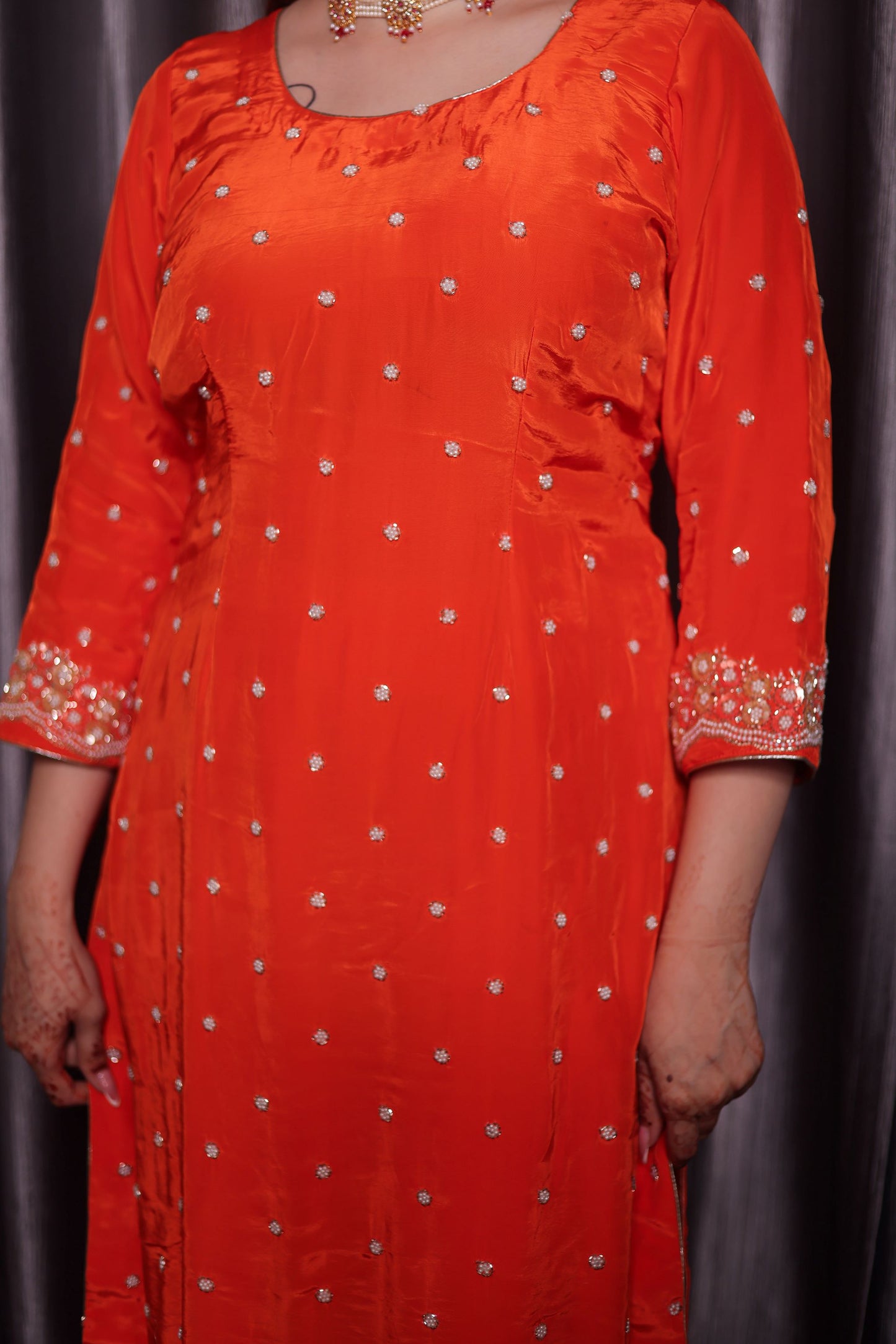 Vibrant Orange Kurta Set with Beautiful Zardozi, Pearl, and Cutdana Work