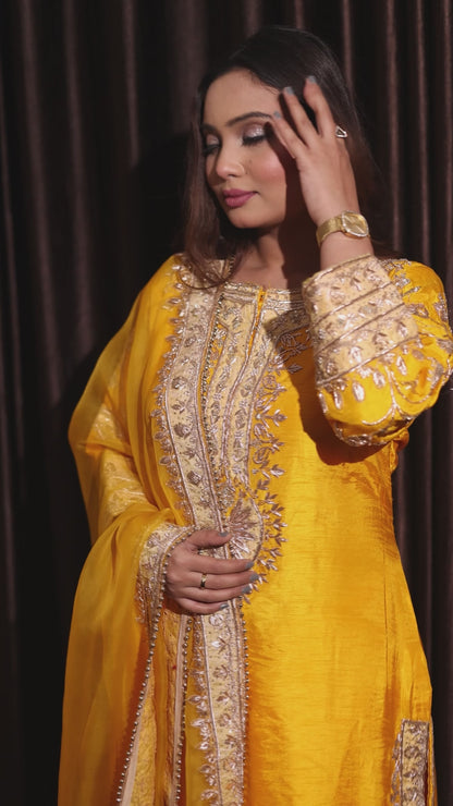 Elegant Saffron Yellow Silk Kurta Set with Intricate Embroidery